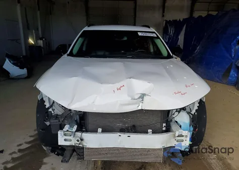 2021 Buick Envision Essence z USA, uszkodzony, nr VIN LRBFZNR49MD084481